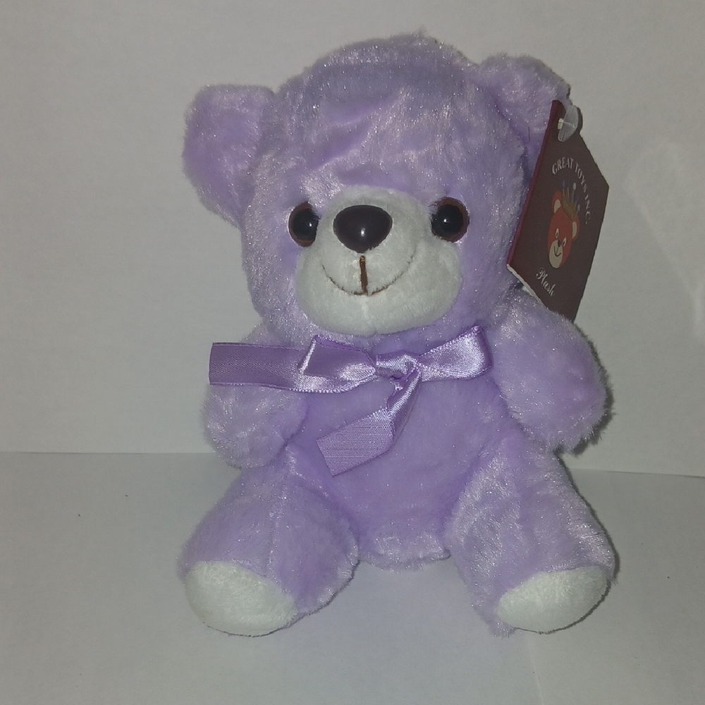 Purple Stuffed Animal with Rounded Body and Bow